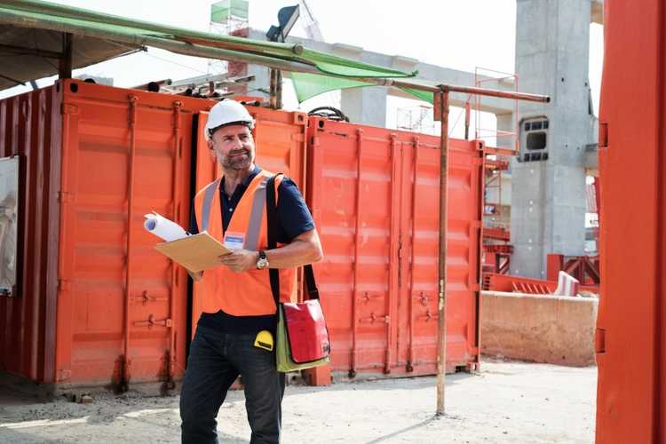 Coordinated dispatch and material delivery workflow at Detroit construction site