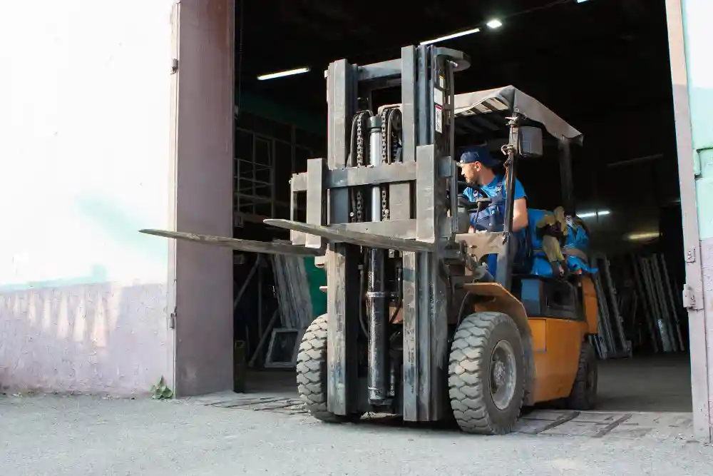 Forklift handling materials at an active Aurora job site