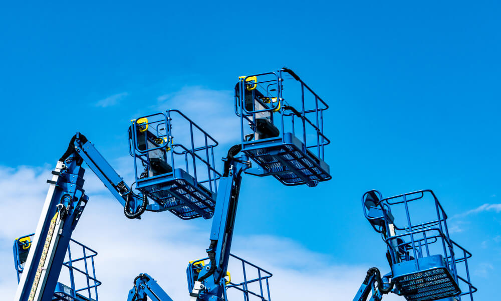 Scissor lift rental handling materials at a construction site in Hermiston, Oregon