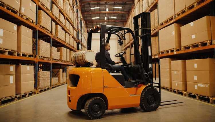 Forklift handling materials at an active Moncks Corner job site