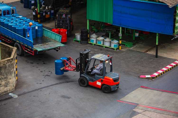 Forklift handling materials at an active Moses Lake job site