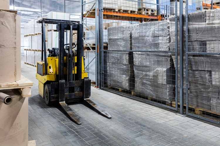 Forklift handling materials at an active Salida job site