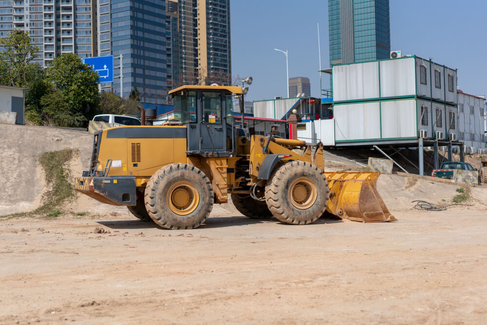 Heavy construction equipment in use at a Coachella, California project site