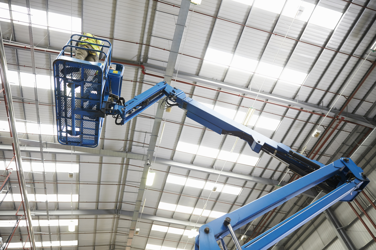 Indoor aerial platform lifting technician for ceiling repairs in Livermore, CA