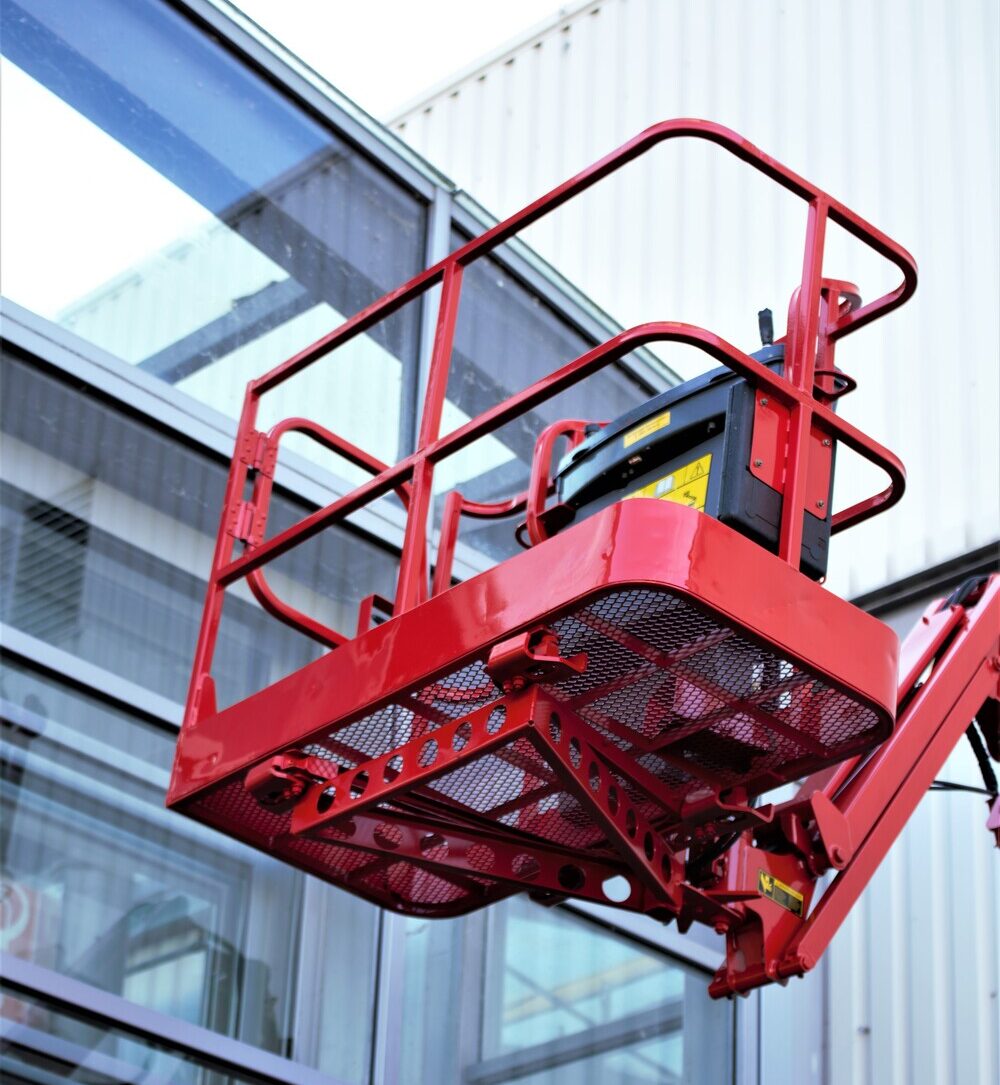 Scissor lift being used on a commercial development project in El Paso, Texas