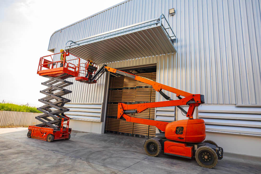 Scissor lift rental handling materials at an active Prineville, Oregon job site
