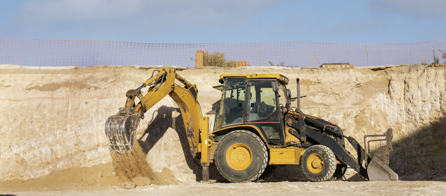 Heavy construction equipment at work on a Sarasota, FL construction project