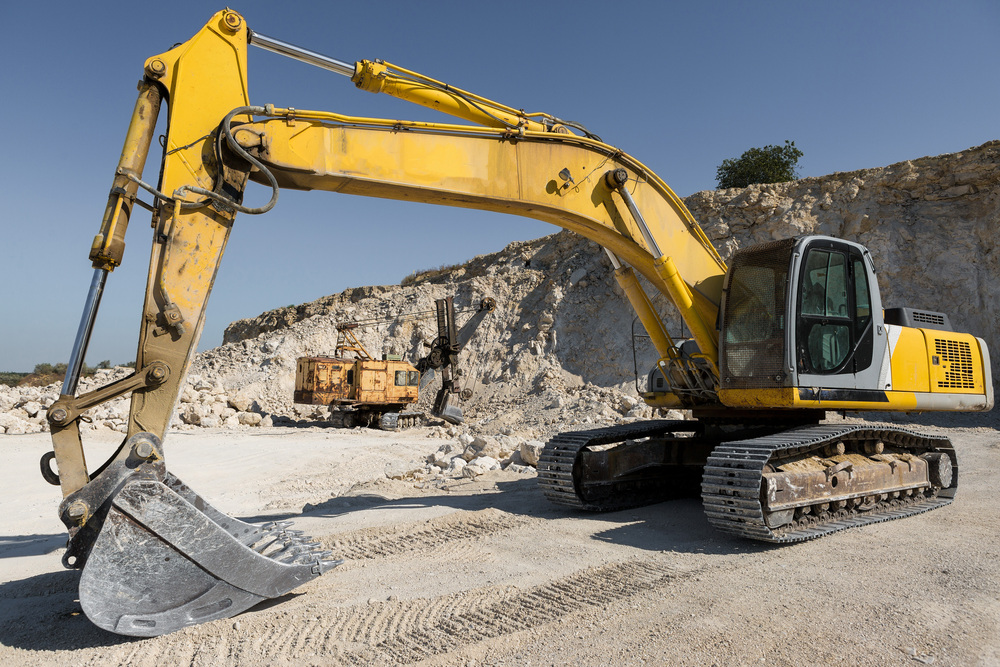 Excavator rental preparing a lot for site development in Fort Collins, CO