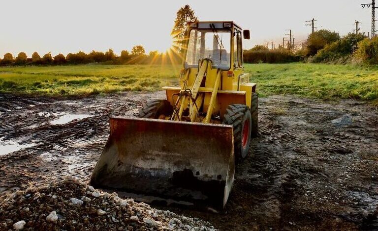 Bulldozer leveling site in rural Auberry, CA