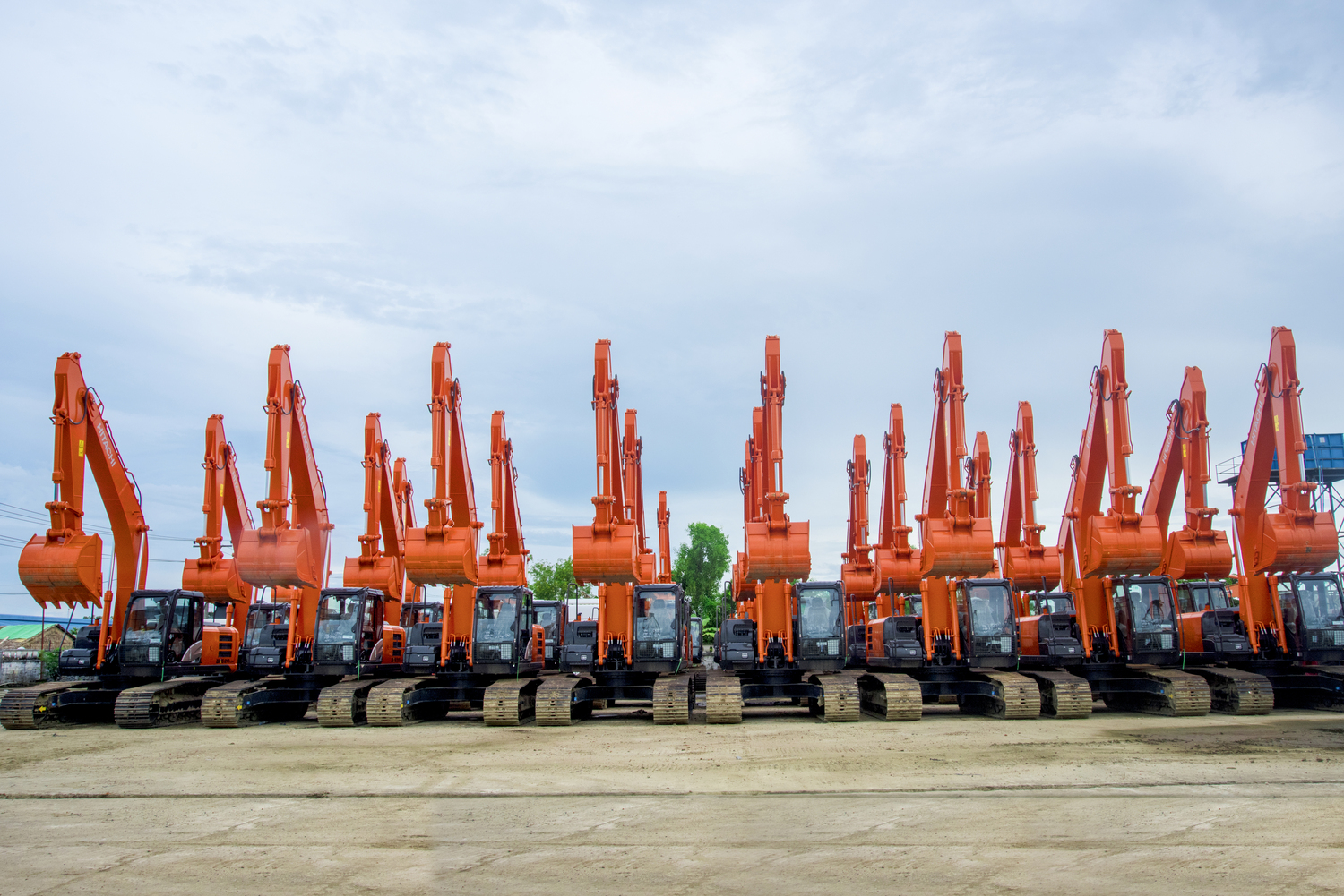 line up of heavy equipments