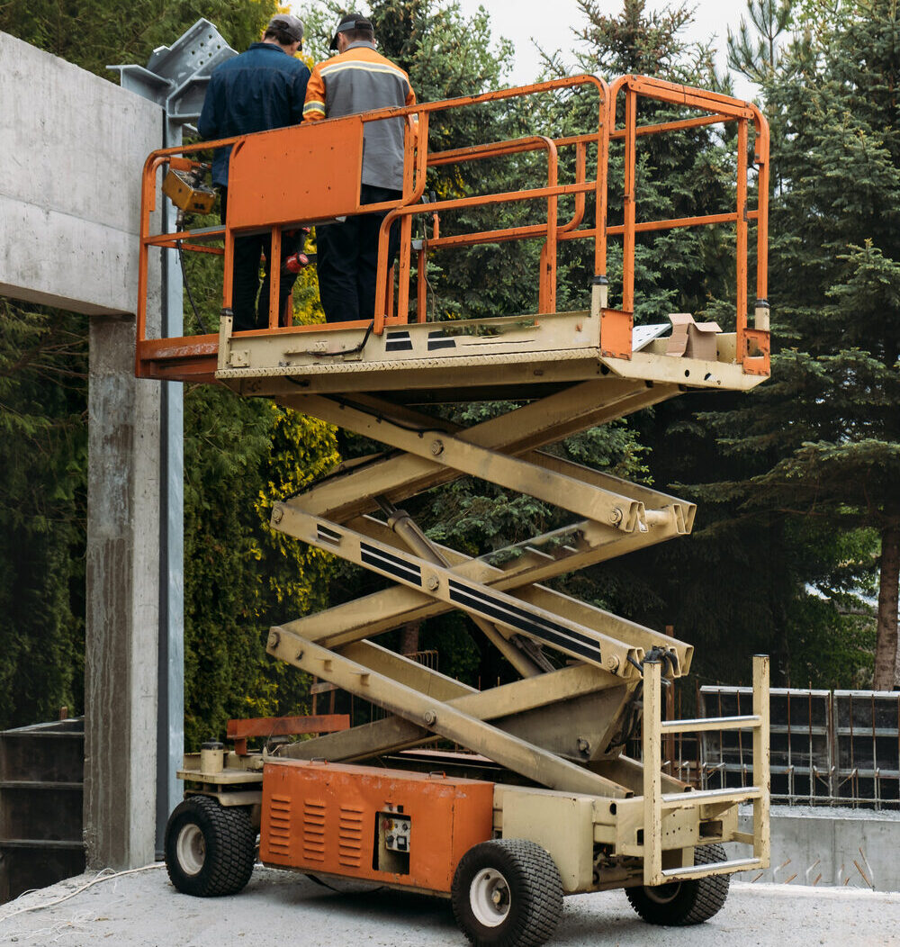 scissor lifts being used on a small commercial project in Williams, CA – Aerial lift rentals for construction projects