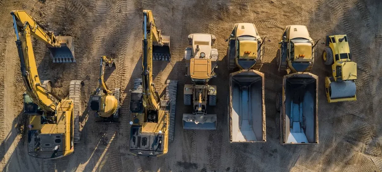 line up of construction equipments