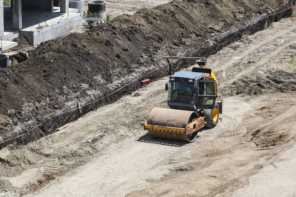 soil compactor grading a construction site in Fort Collins, Colorado