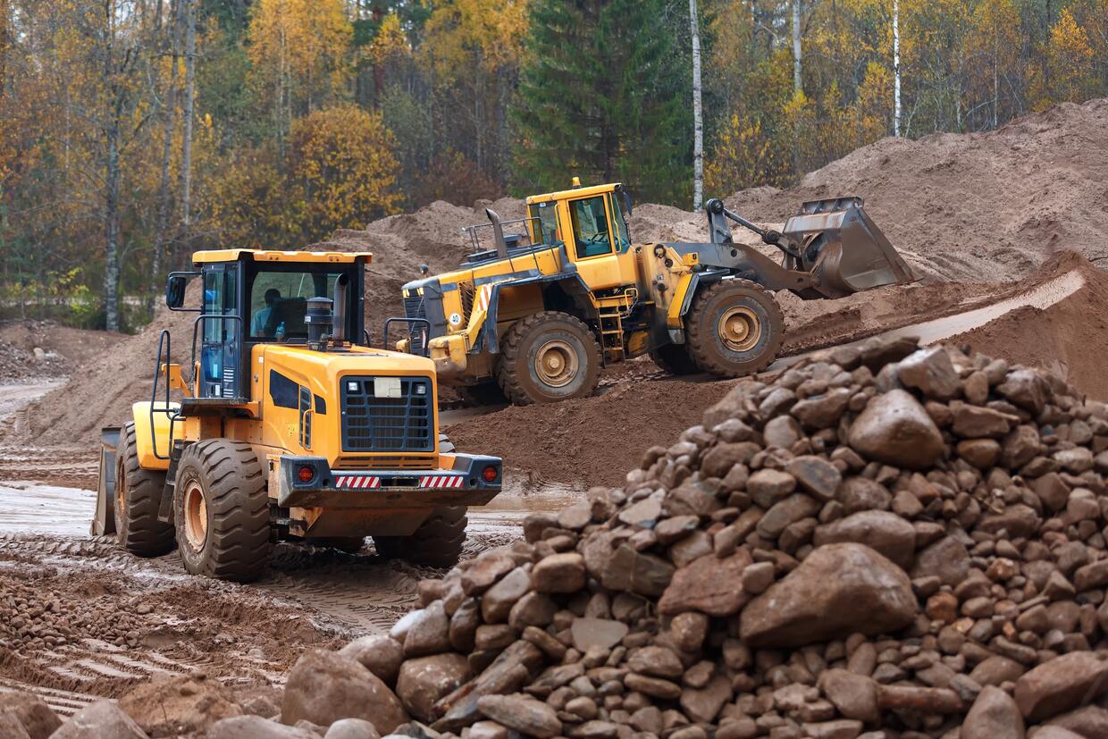 wheel loaders transporting construction materials in French Camp, CA