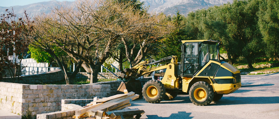 Construction equipment working along hillside terrain in Auberry, California111