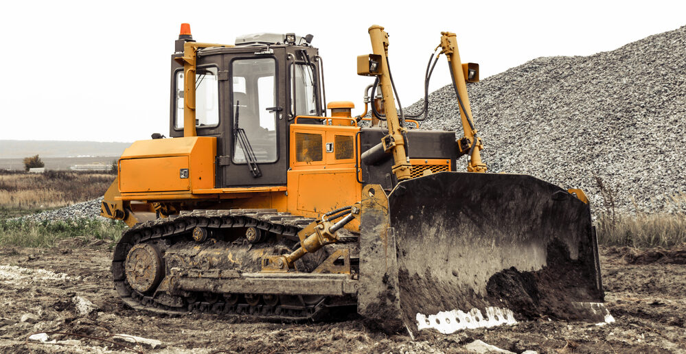 Excavators and graders ready for earthmoving work in Williams, CA – Heavy machinery rental for construction