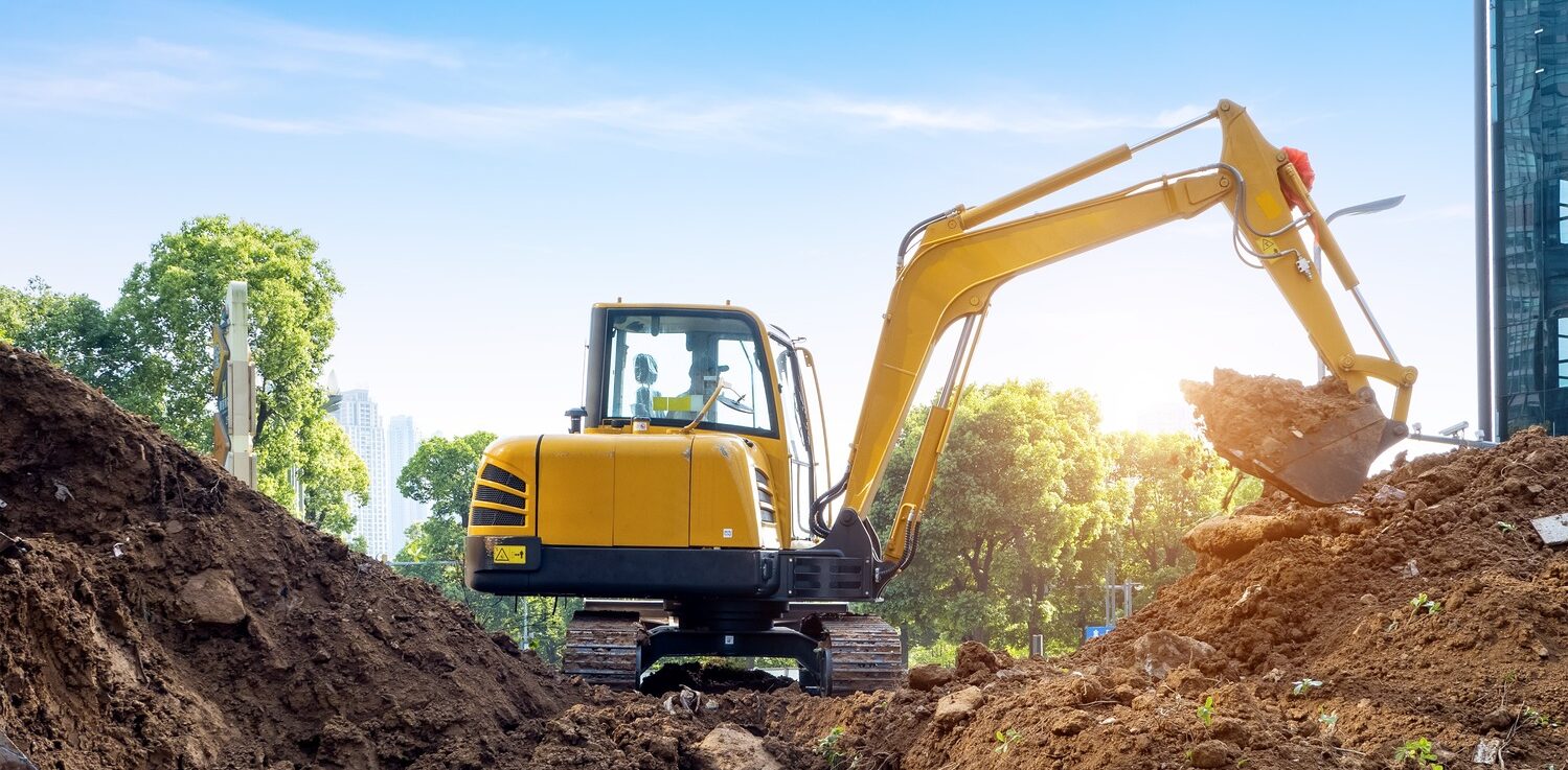 Excavators,Excavate,Earth,At,The,Construction,Site